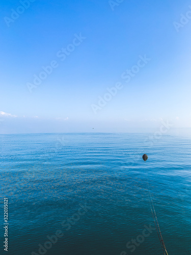 Blue sea and sky background © Oksana