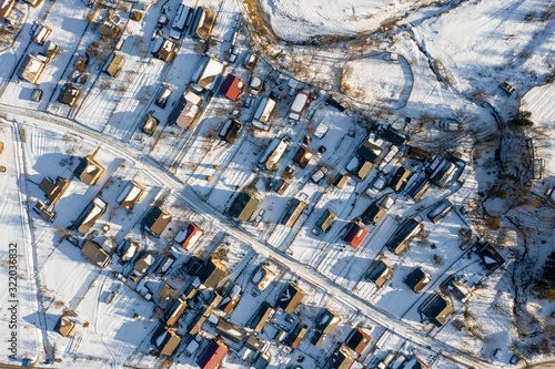 aerial view over private houses in wintertime