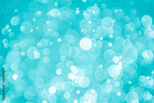 abstract aqua blue background with soft blur bokeh light effect