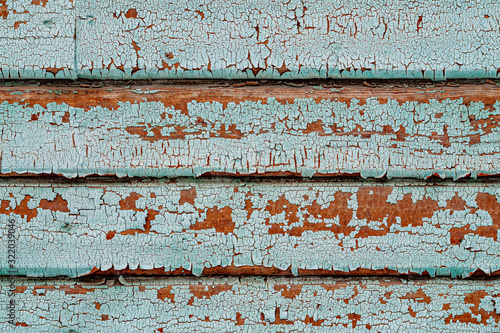 background with planks covered with cracked paint