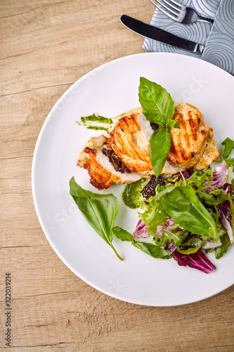 grilled chicken breast and salad