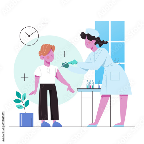 Vaccination concept. Boy having a vaccine injection. © inspiring.team