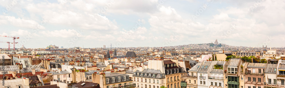 Panoramic view, aerial skyline of Paris on city center, Sacre Coeur Basilica, churches and cathedrals, architecture, roofs of houses, streets landscape, Paris, France