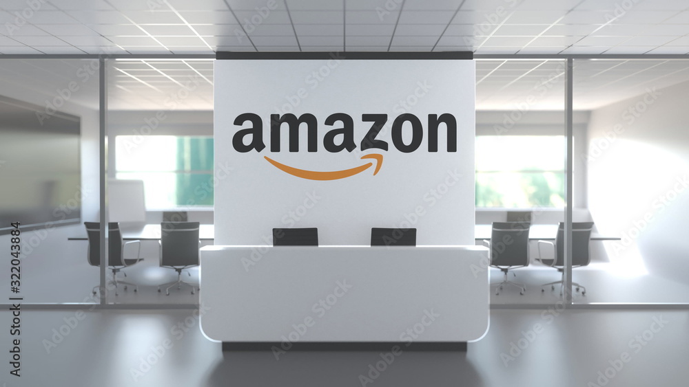 AMAZON logo above reception desk in the modern office, editorial ...