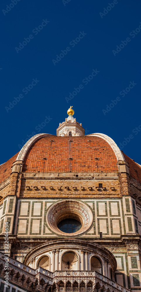 Beautiful dome of Saint Mary of the Flower in Florence seen from below, built by italian architect Brunelleschi in th 15th century and symbol of Renaissance in the world (with copy space above)