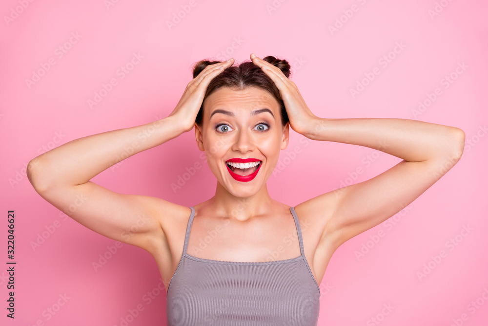 Photo of funky youngster lady pretty buns red lipstick open mouth arms on head good news overjoyed wear casual summer grey tank-top isolated pastel pink color background Photo of funky youngster lady pretty buns red lipstick open mouth arms on head good news overjoyed wear casual summer grey tank-top isolated pastel pink color background
