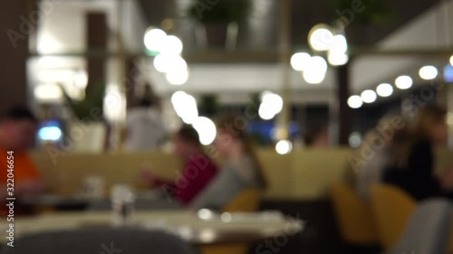 Wallpaper Mural People in the restaurant. Defocused image as background. Torontodigital.ca