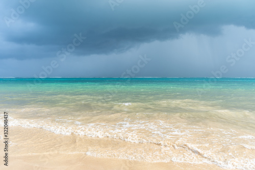 Caribbean sea coast. Blue sky with clouds and turquoise water. Travel photo, background, wallpaper. Copy space. Place for text. Yucatan. Quintana roo. Mexico.