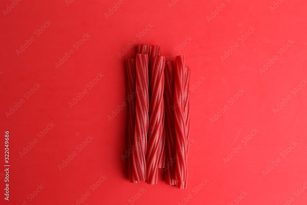 sweet red gummy licorice in color background