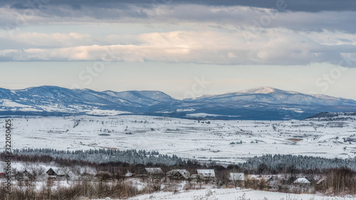winter landscape with mountains and clouds © b. Sergiu