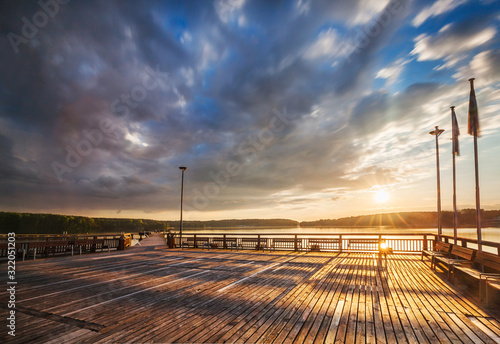 Fototapeta Naklejka Na Ścianę i Meble -  sunset over the lake Ukiel Olsztyn