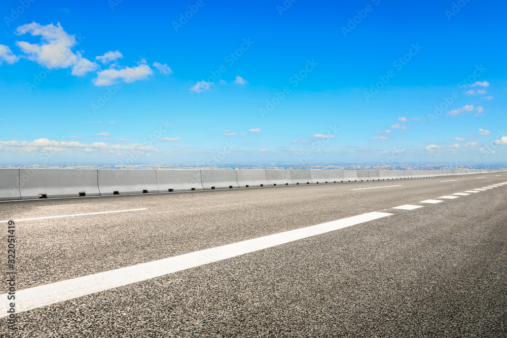Fototapeta premium High angle Shanghai city skyline and empty asphalt road