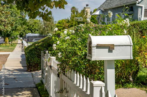 Konstfotografi white mailbox by the family house