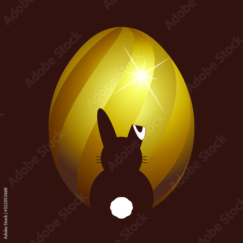 Illustration vectorielle avec un œufs de Pâques or 3D et une silhouette de lapin sur un fond couleur chocolat.