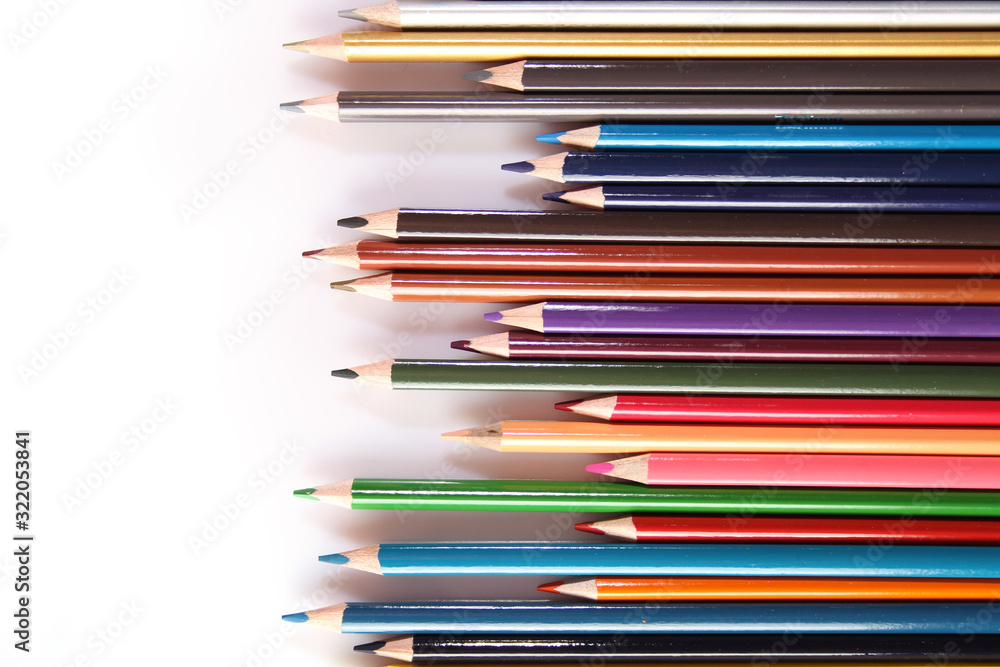 Colored pencils lie in a row Colored pencils lie in a row