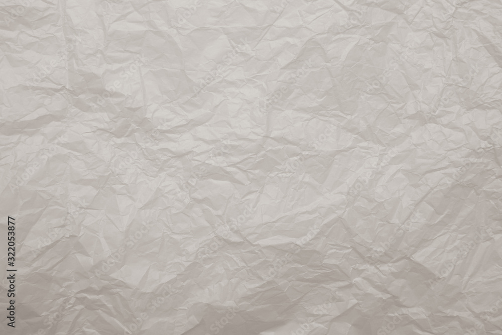 Naklejka premium Old crumpled grey paper background texture