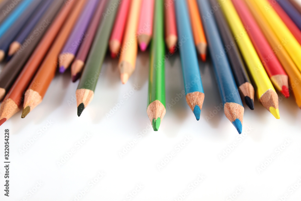 Colored pencils lie in a row Colored pencils lie in a row