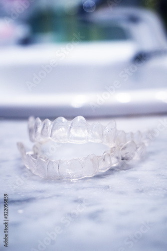 Transparent plastic splint for dental alignment