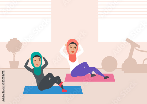 two arab women exercising in gym