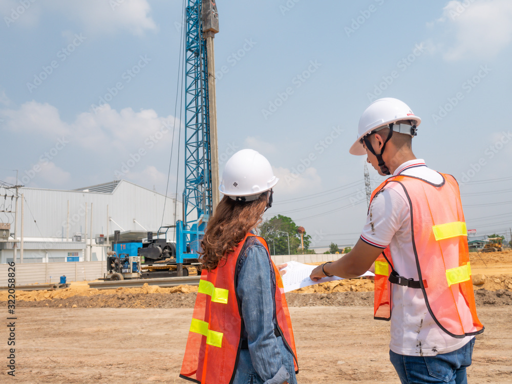 Asian engineer Construction project surveyor. Concept Engineer and civil work Asian engineer Construction project surveyor. Concept Engineer and civil work