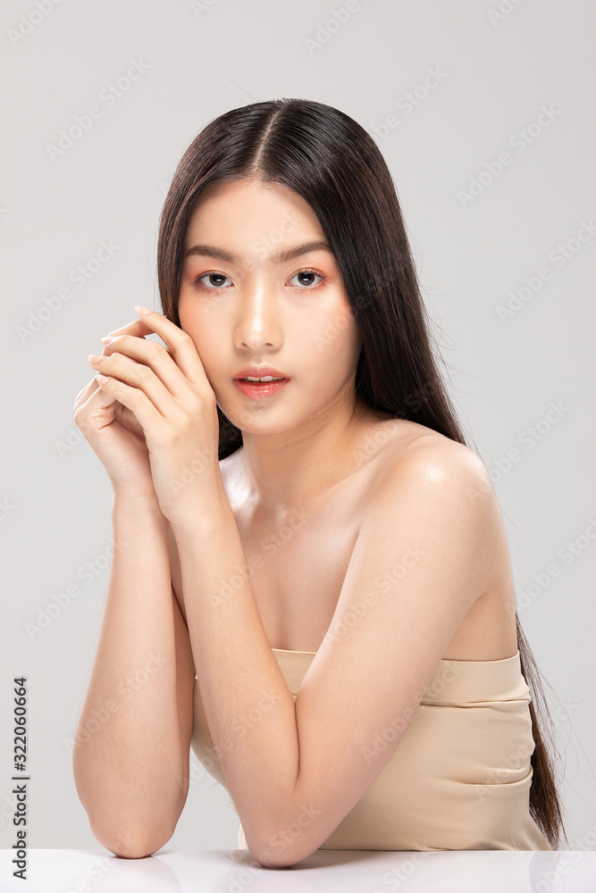 Beautiful Young Asian Woman Holding Hands smile feeling so happy and cheerful with healthy Clean and Fresh skin,isolated on white background,Beauty Cosmetics Concept Beautiful Young Asian Woman Holding Hands smile feeling so happy and cheerful with healthy Clean and Fresh skin,isolated on white background,Beauty Cosmetics Concept