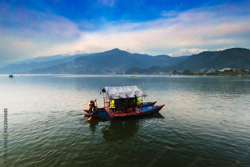 Boat with Tourists in Phewa Lake Pokhara Nepal.