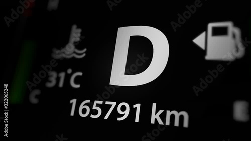 Digital Odometer Display Animation on Car Dashboard photo