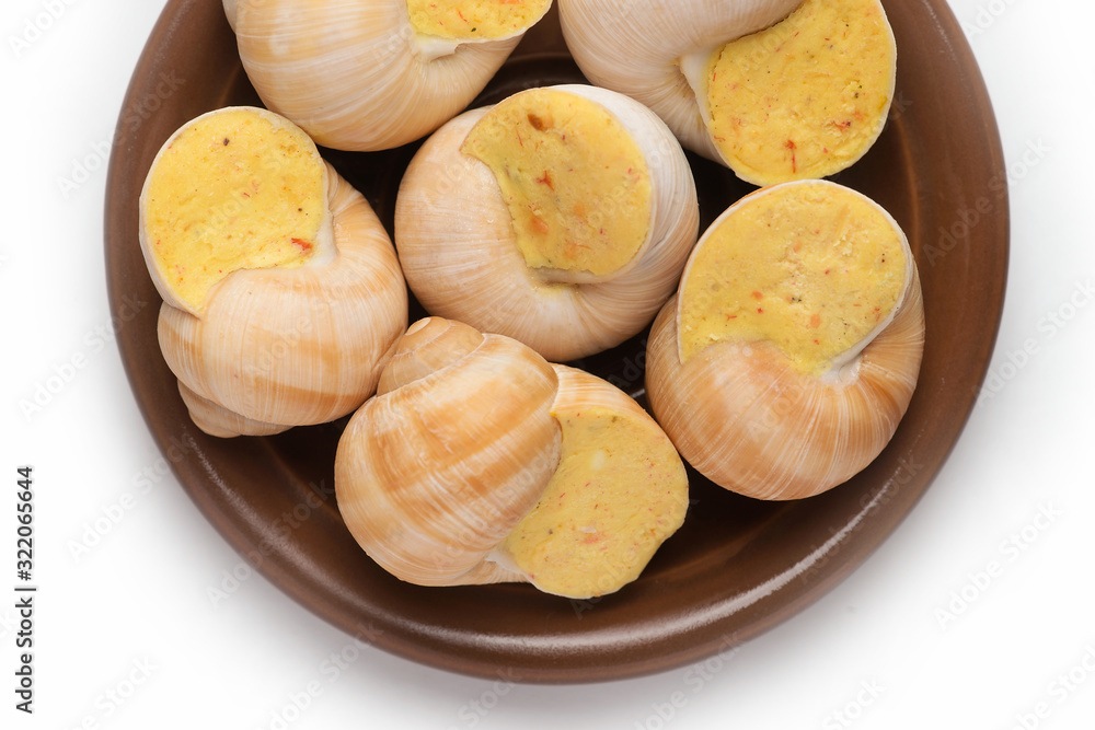 still life of stuffed snail sauce, on a white background still life of stuffed snail sauce, on a white background