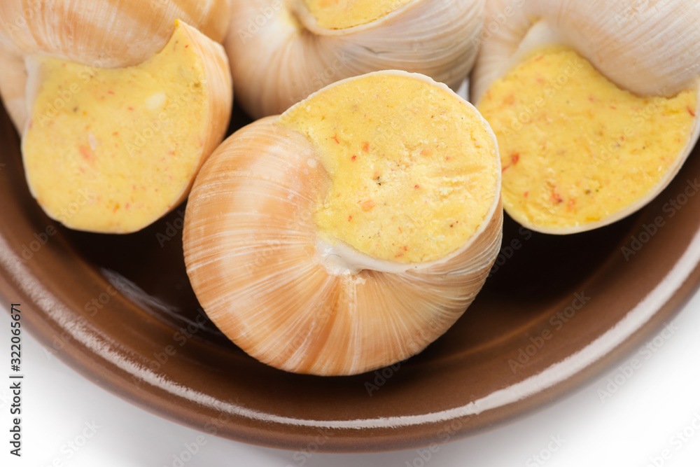 still life of stuffed snail sauce, on a white background still life of stuffed snail sauce, on a white background
