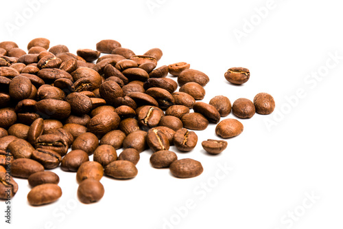 Coffee. roasted coffee beans on white background in close-up