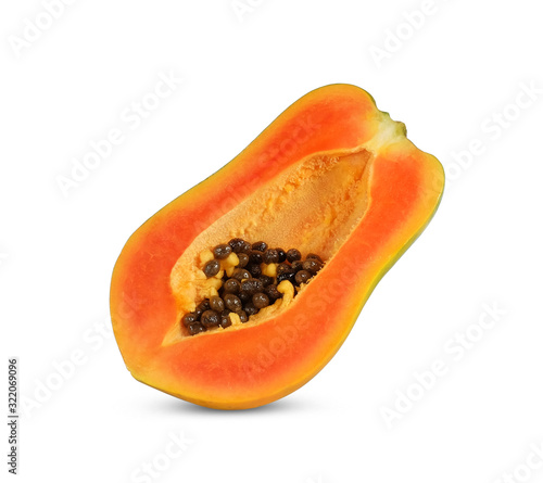 A half of ripe papaya fruit with seeds isolated on white background..