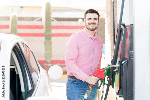 Confident Man At Gas Station