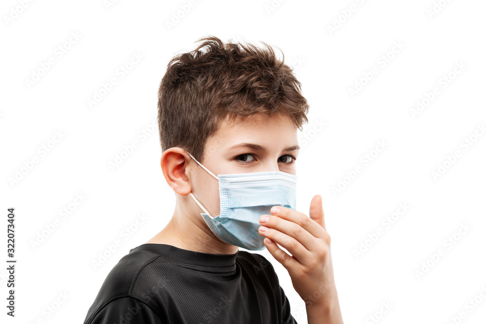 Teenager boy wearing respiratory protective medical mask Teenager boy wearing respiratory protective medical mask