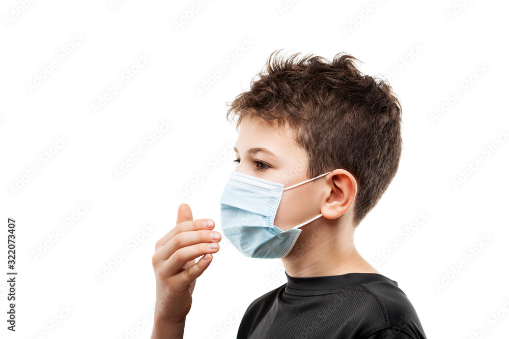 Teenager boy wearing respiratory protective medical mask Teenager boy wearing respiratory protective medical mask