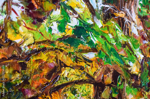 Multi-colored oil strokes in a picture close on canvas