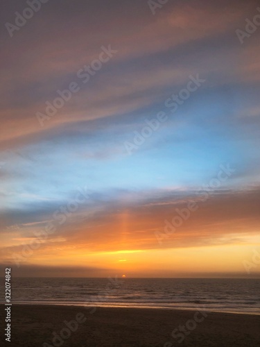 Sunset at the beach Julianadorp Netherlands. Coast Northsea.  © A