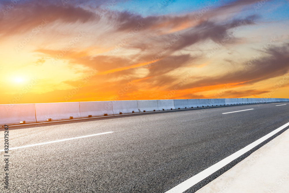 Fototapeta premium Empty asphalt road and sunset sky landscape in summer