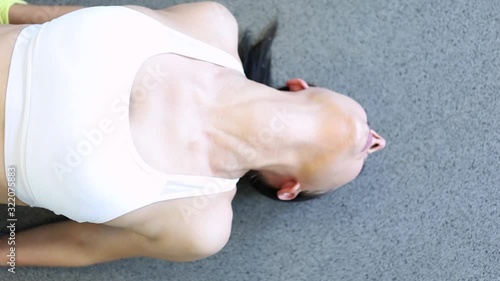 Wallpaper Mural Beautiful athletic female fitness model is performing a yoga back bridge stretching her spine and body to attain better wellness and fitness for a healthy lifestyle. Her flexibility routine workout Torontodigital.ca