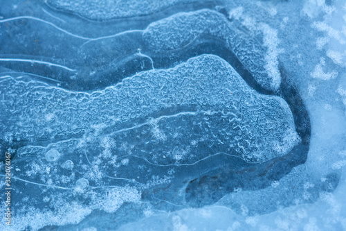Blue ice on frozen water