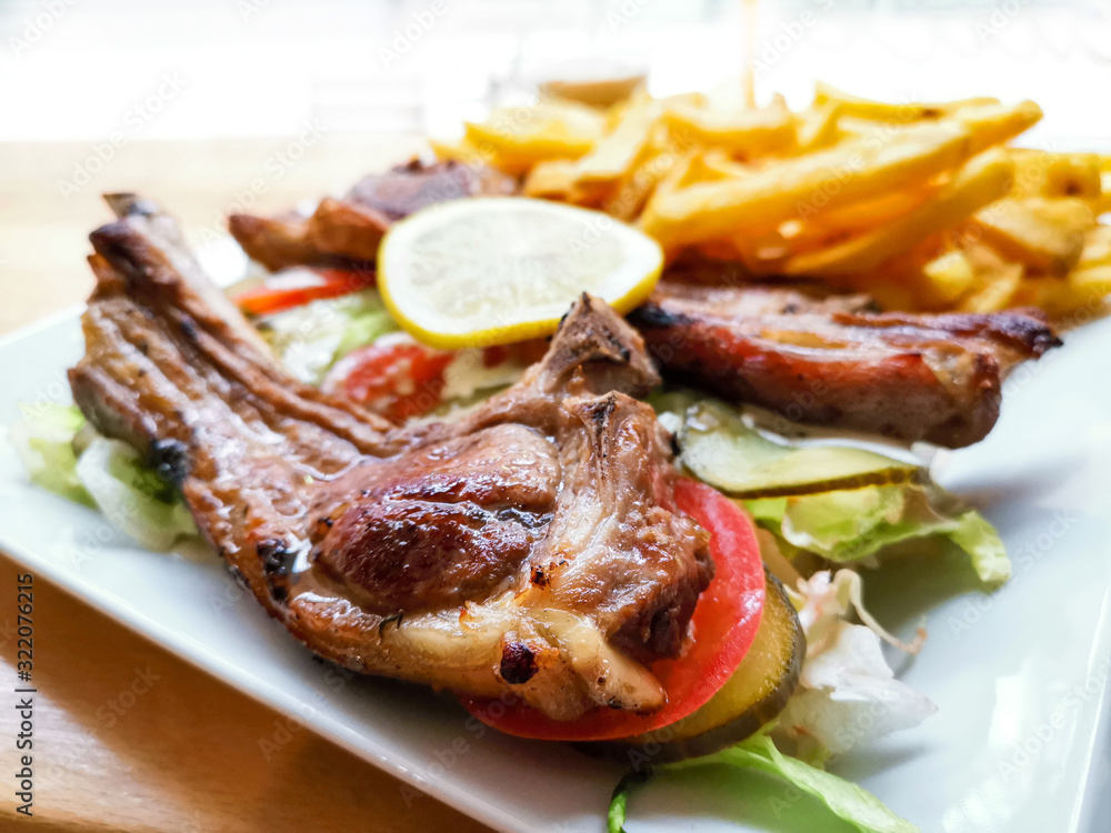 juice roasted lamb chops on the table juice roasted lamb chops on the table