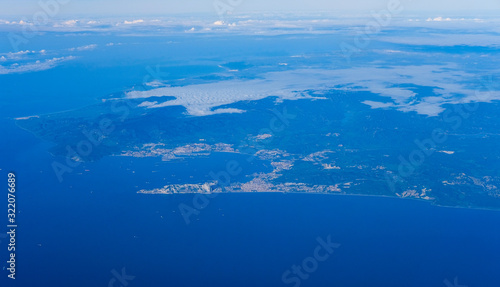 Aerial shot of the Strait of Gibraltar with its bay taken from up high from the flight deck of an airliner