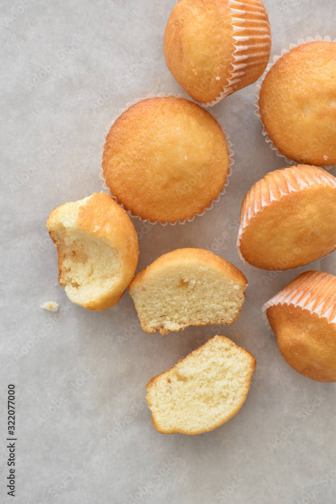 Muffin cake on a parchment paper with copy space. Selective focus. Muffin cake on a parchment paper with copy space. Selective focus.