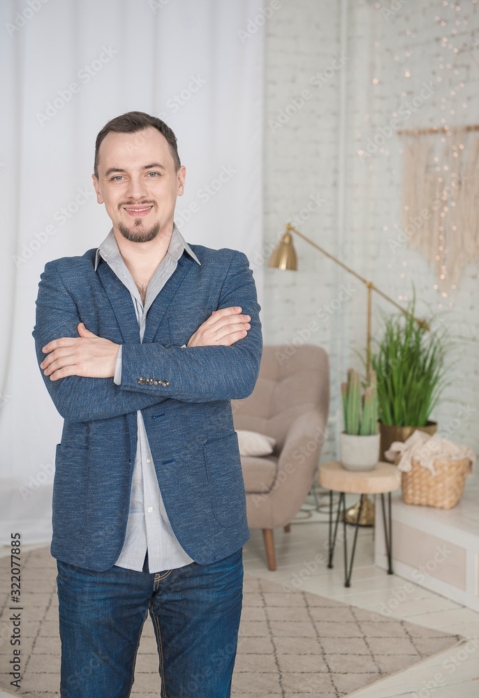 Handsome happy man smile standing at home Handsome happy man smile standing at home