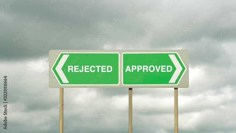 Decision Rejection or Approval. Signs pointing in opposite directions to Approved or Rejected outcomes. Decision Rejection or Approval. Signs pointing in opposite directions to Approved or Rejected outcomes.