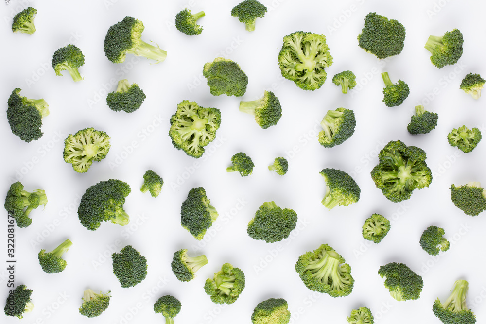 Broccoli pattern isolated on a white background. Various multiple parts of broccoli flower. Top view. Broccoli pattern isolated on a white background. Various multiple parts of broccoli flower. Top view.