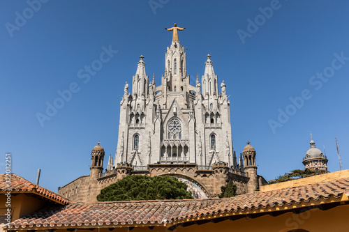 Barcelona, Catalonia, Spain. Temple of the Sacred Heart of Jesus. The Church on Mount Tibidabo with the Jesus Statue on Top. Perfect Blue Sky