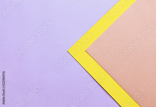 Abstract geometric background in soft pastel trend colors, made from watercolor paper.