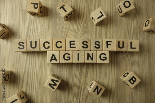 Text successful aging from wooden blocks