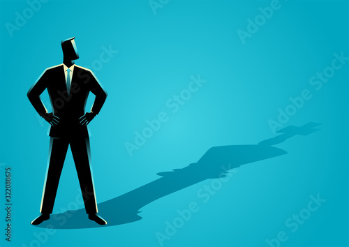 Businessman standing with the shadow of a chess king