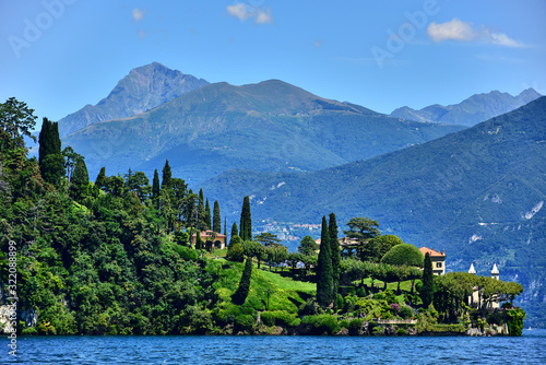  mountains covered with trees, a villa and a beautiful garden